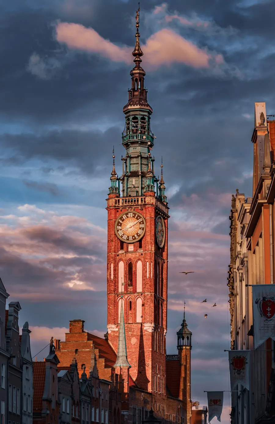 Cityscape photograph: Gdańsk Town Hall tower at sunset