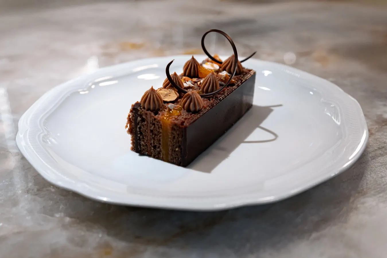 Slice of chocolate cake with chocolate decorations