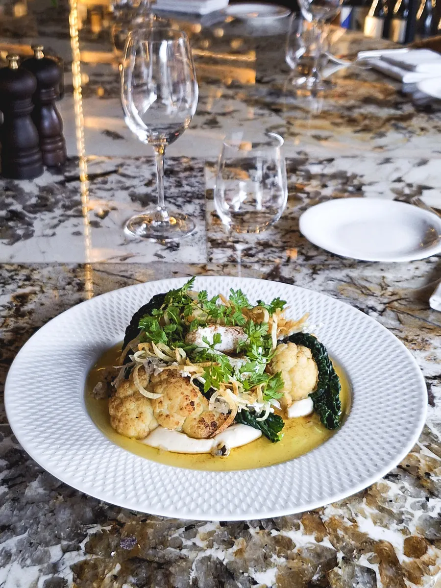 Roasted cauliflower dish on a restaurant table
